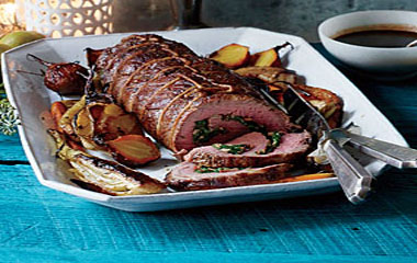 Spinach and Mushroom-Stuffed Beef Tenderloin with Truffled Wine Sauce